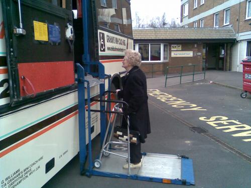 Disabled passenger about to be lifted into Coach.