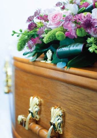 Coffin And Flowers