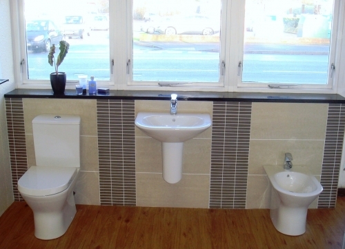 View our wide collection of Bathroom Suites in our Showroom