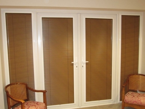 Custom made perfect fit Venetian Blinds sit neatly in the window frame in Angmering village, West Sussex Jpg