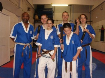 Sensei Michael achieving his black belt