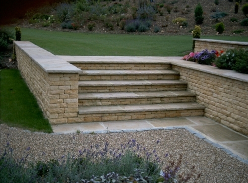 Dressed dry stone walls with dry stone risers & indian paving