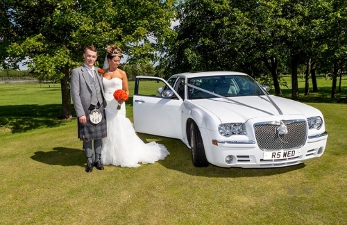 white Chrysler baby Bentley wedding car